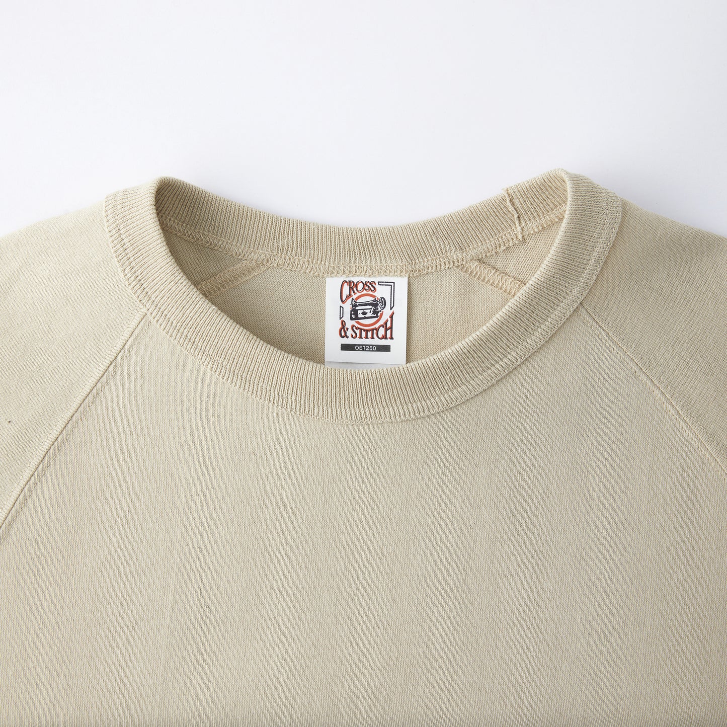 CROSS & STITCH オープンエンド リラックスフィット ラグランTシャツ